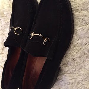 Black suede Gucci loafers with rubber soles